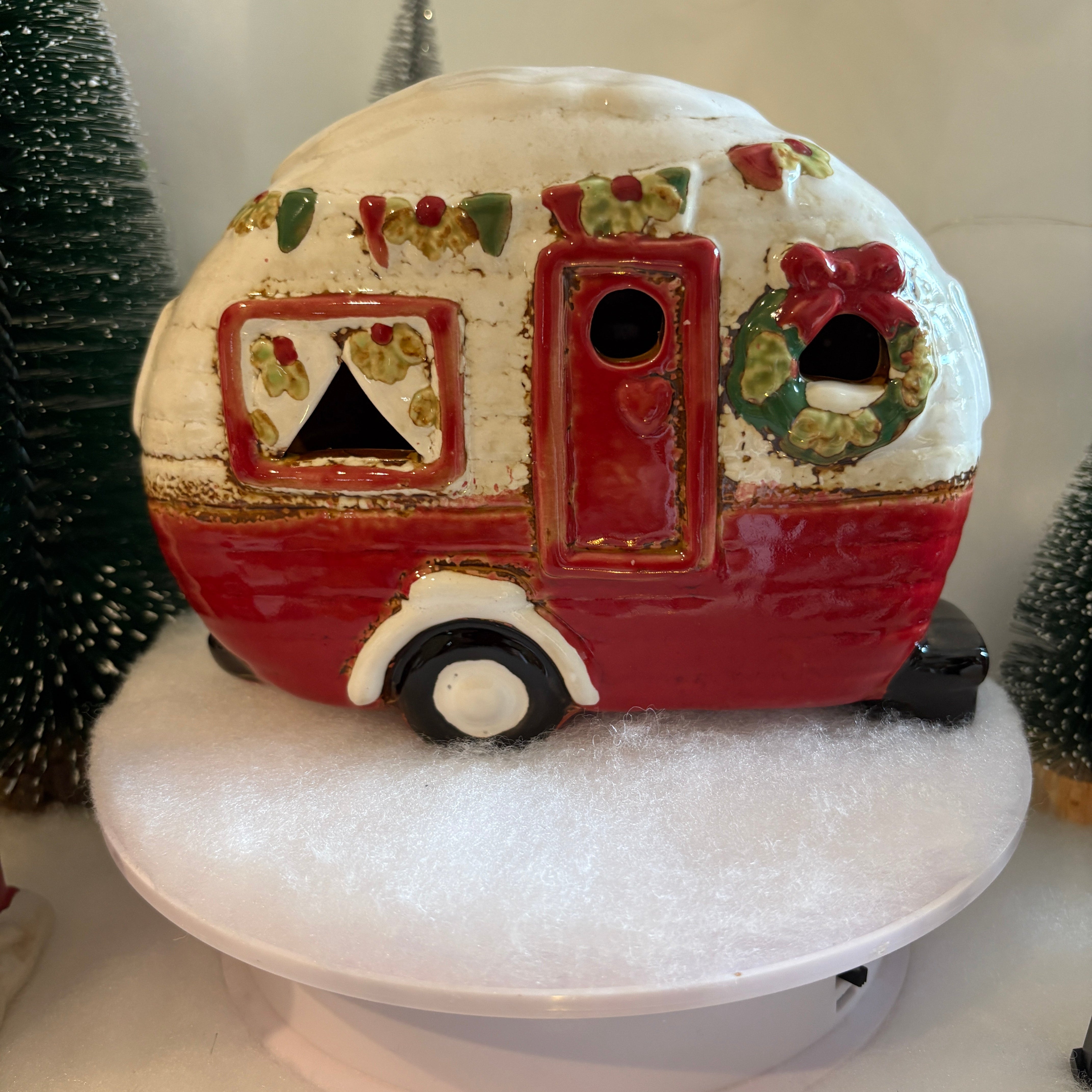 Decorative object with red and white design on a white background